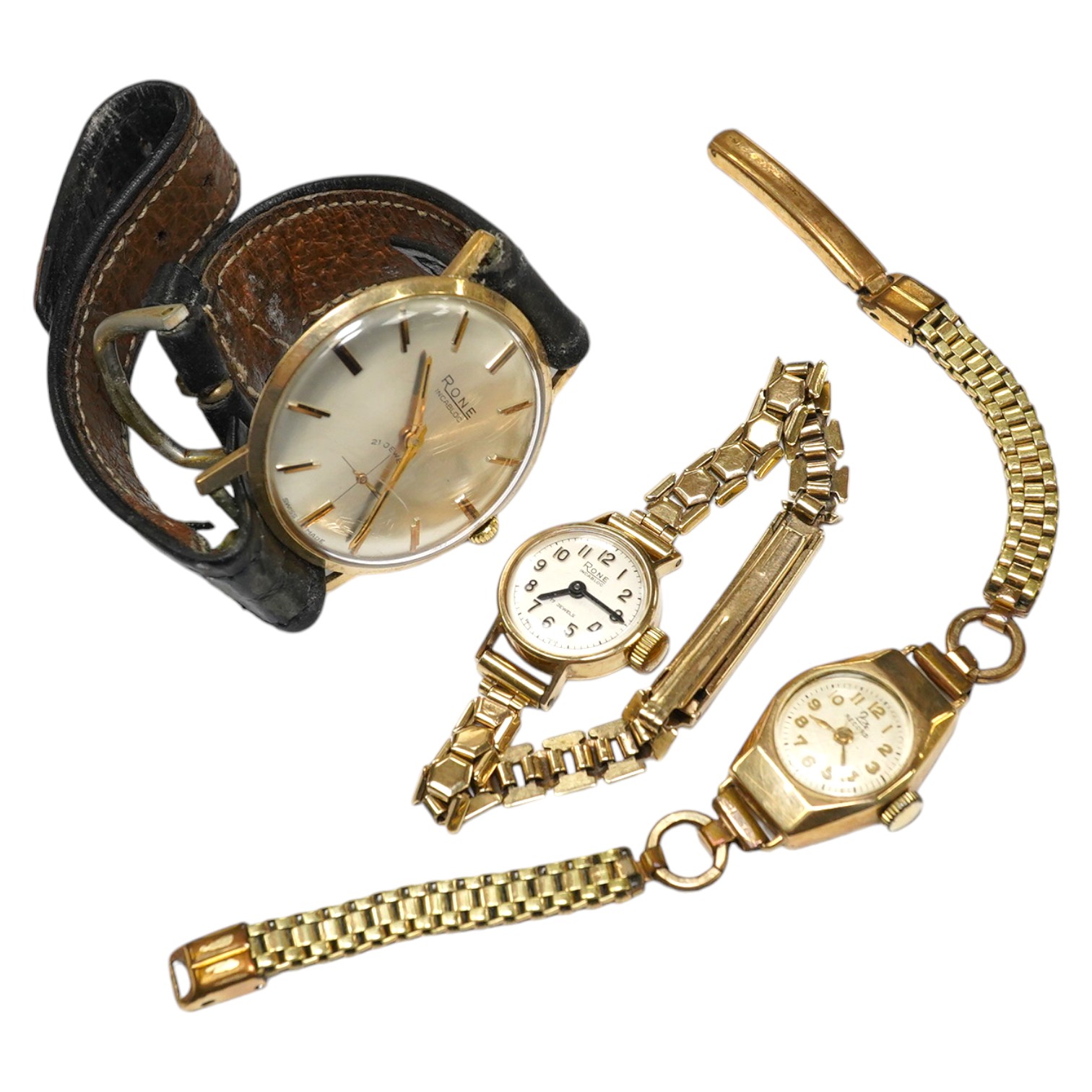 A ladies 9ct gold Rone Incabloc wrist watch with gilt strap and original box, a 9ct gold Record wrist watch with gold plated bracelet, and a gentleman's 9ct gold Rone Incabloc wrist watch in original box (3). Condition -